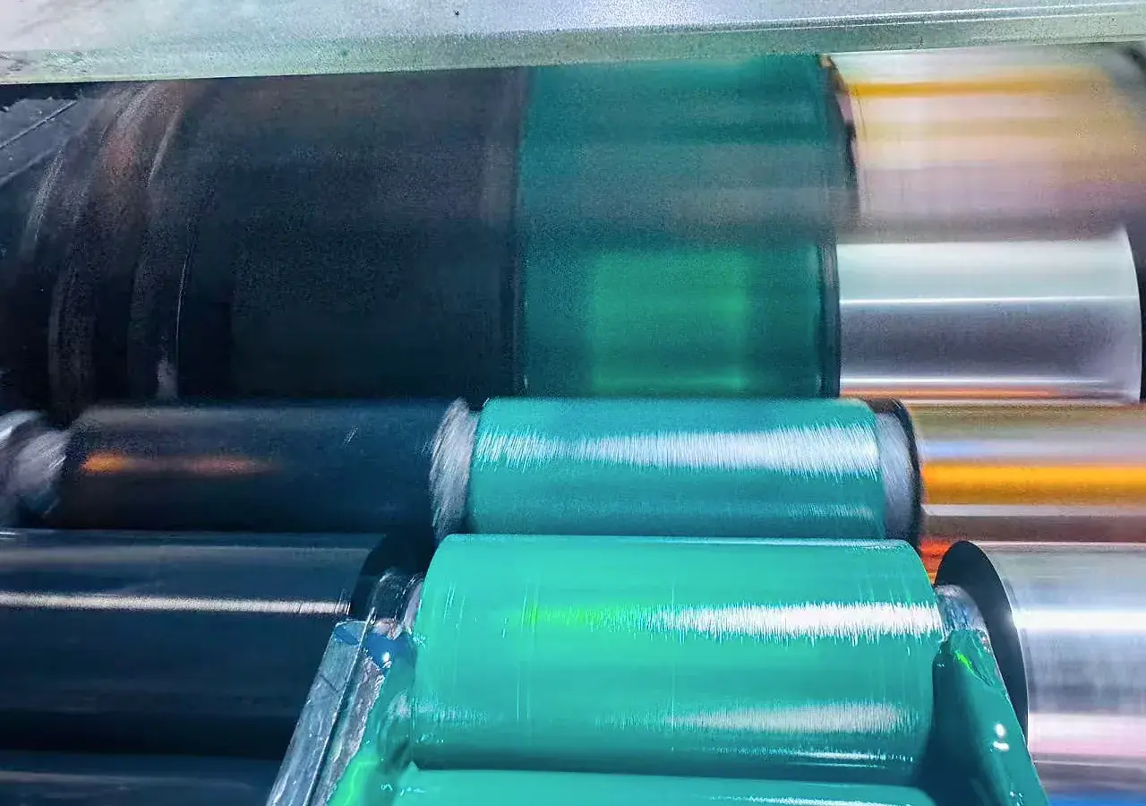 Close view of real label printing rollers during production